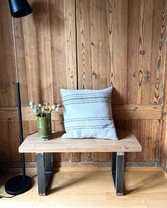 Handcrafted wooden bench with metal feet